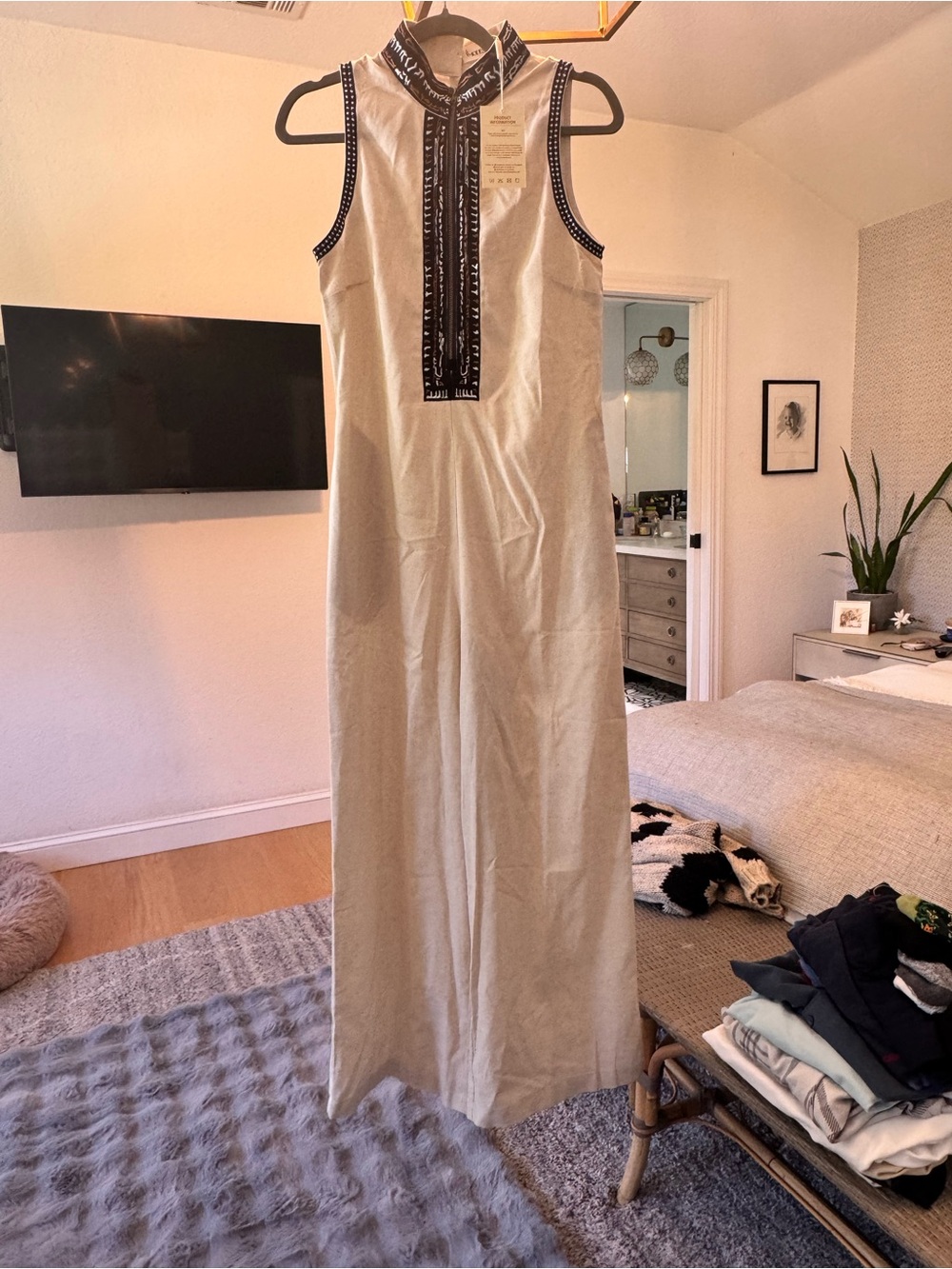 Sleeveless Cream Maxi Jumpsuit with Black Trim